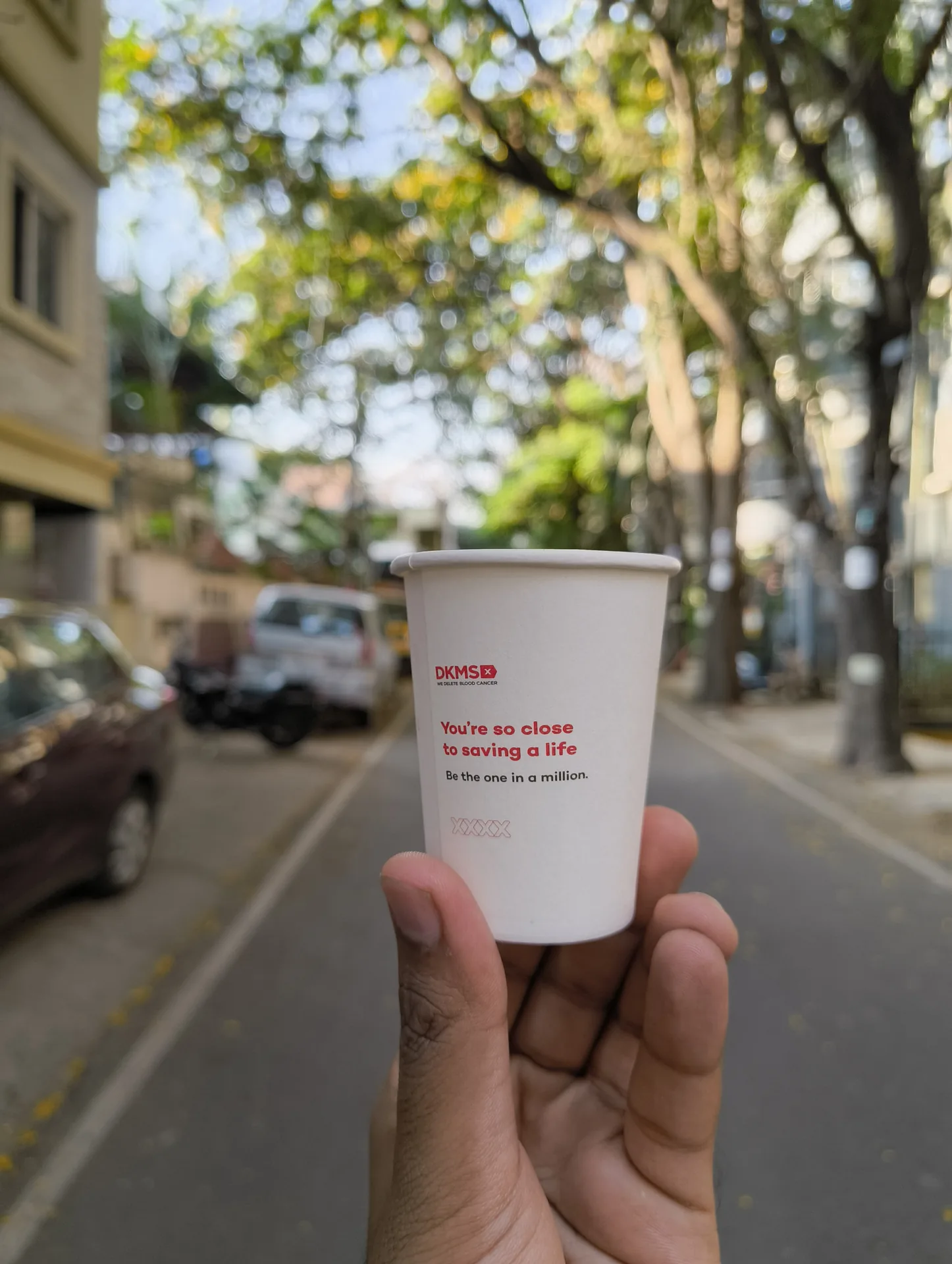 QR-enabled campaign cup in use